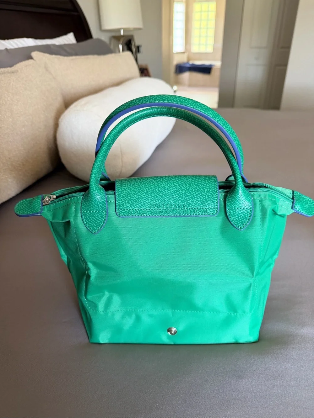Longchamp green nylon top-handle tote with blue logo